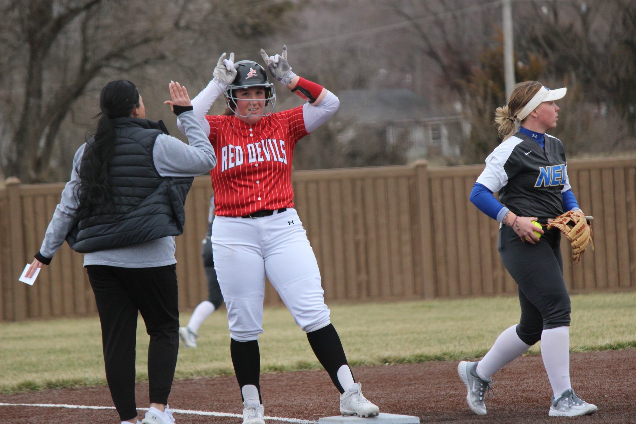 Red Devils Sweep NEO on Opening Day